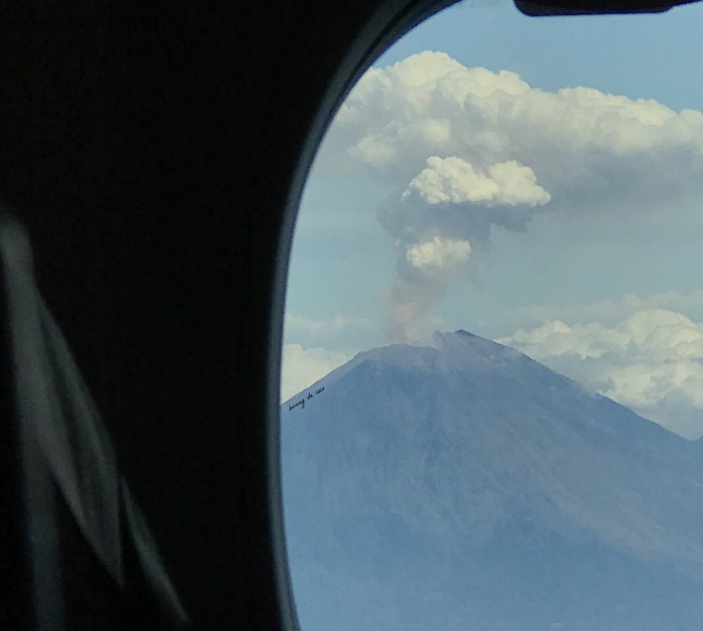 Mount Agung cooling off after an eruption, as seen from my airplane seat.